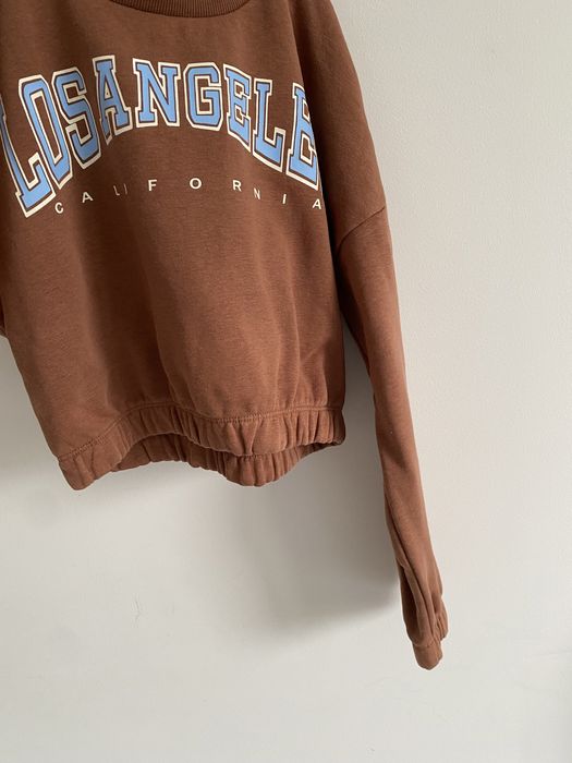 Bluza krótsza czekoladowa lindex 134/140 niebieaki napis