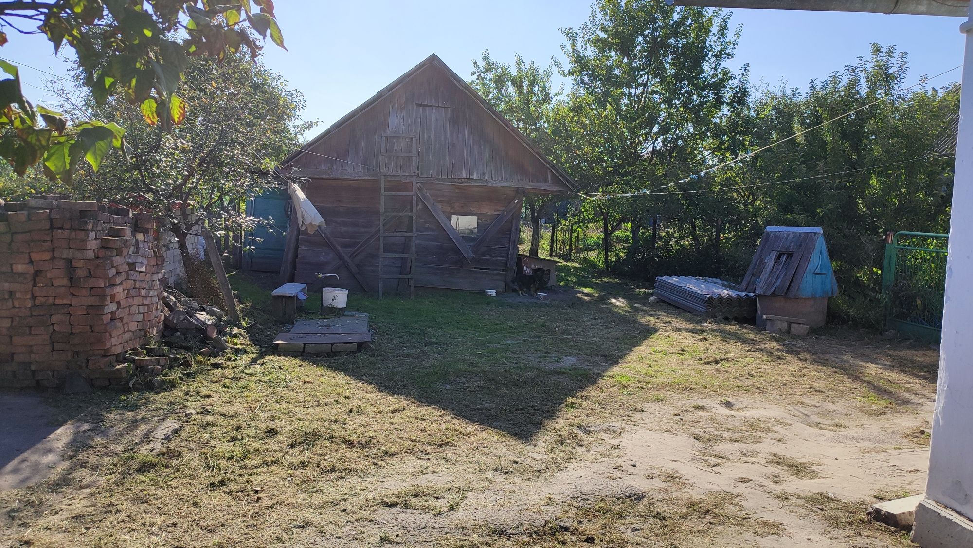 Продам 1/2 будинку та земельну ділянку 0,913 га