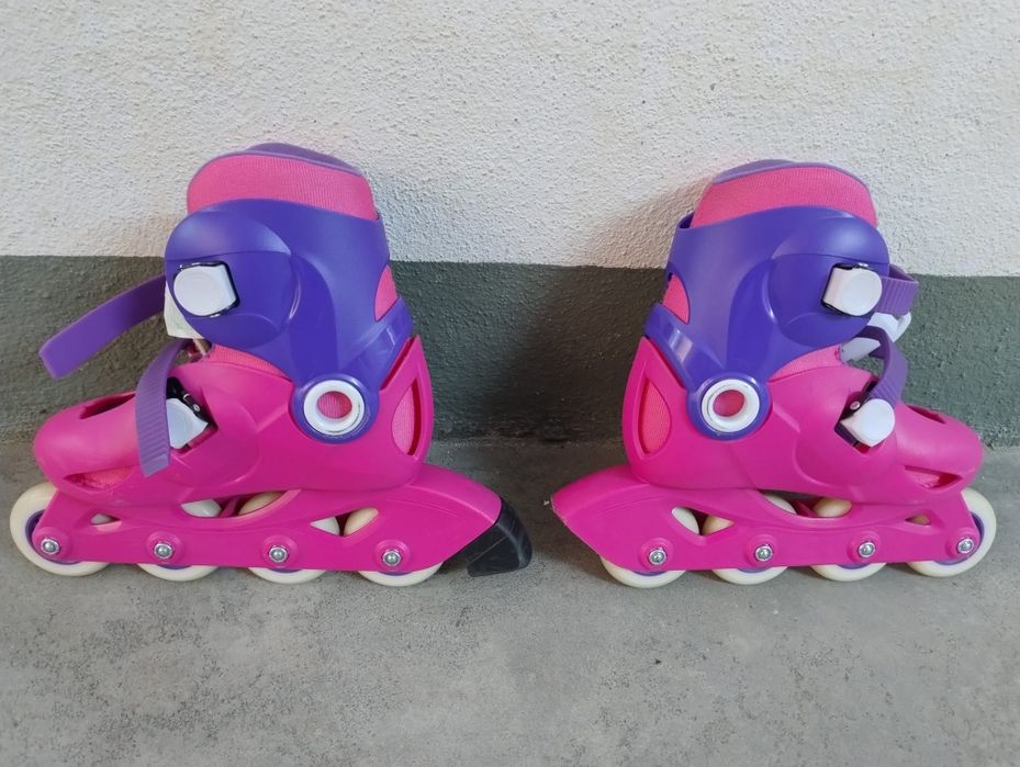 Patins rosa e roxo. Tamanho 28