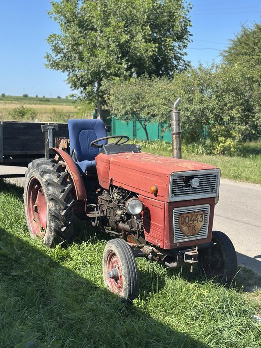 Трактор універсал 445 , причеп , косарка роторна z-069