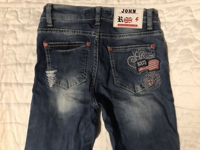 Modne jeansy 146/152