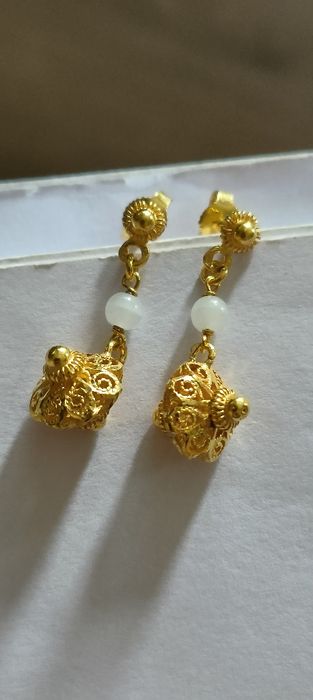 Brincos em filigrana