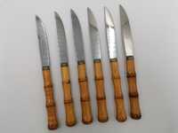 Zestaw starych metalowych noży z drewniana rączką