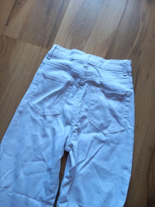 Biale jeansy H&M 32