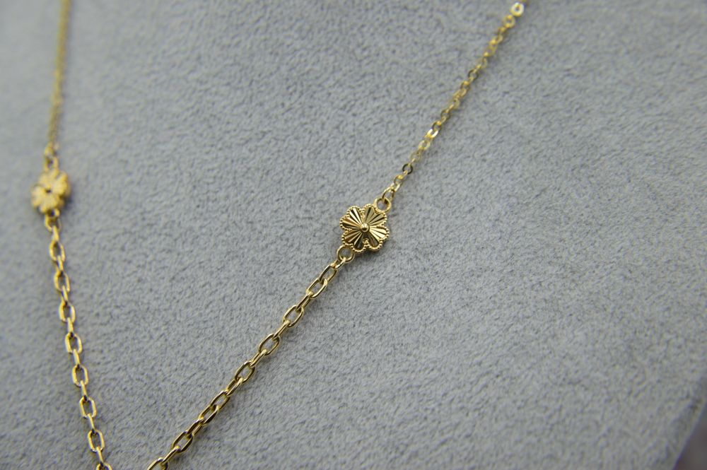 Złoty komplet biżuterii z koniczynami czterolistnymi bransoletka 585