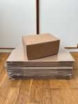 Pack de 10 caixas de cartão para envio postal