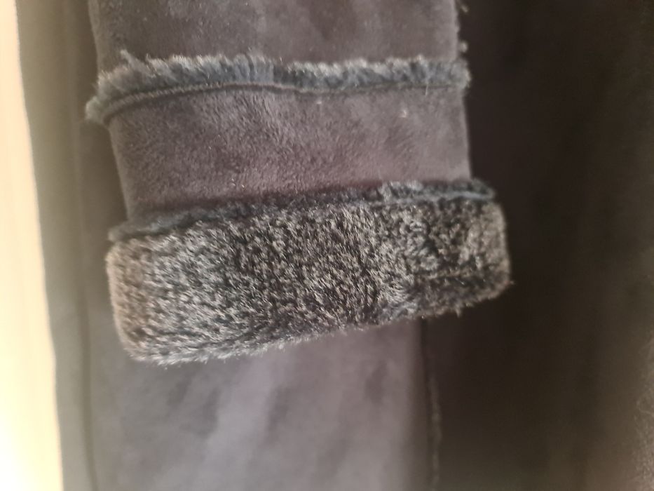 Casaco preto de pêlo por dentro