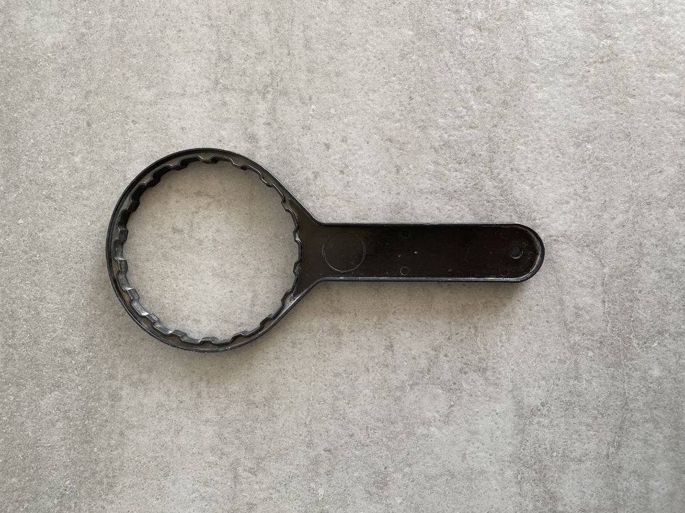 Пластиковый ключ для колбы фильтра Atlas