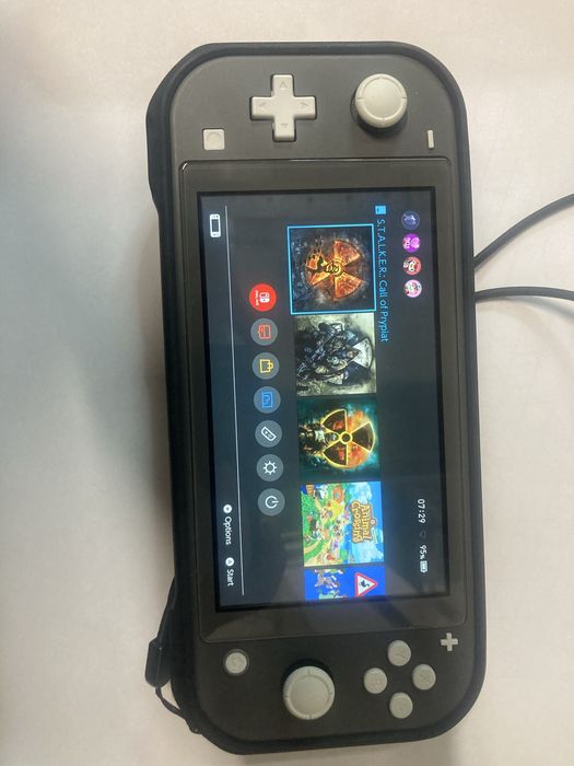 Nimtendo Switch Lite z gra Wiedzmin 3 (konsola nie laczy sie)