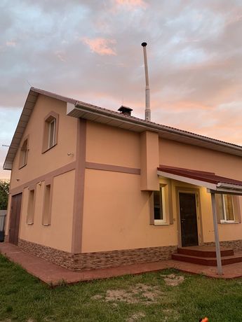 Продажа комфортного  дома  в селе Пуховка  109000у.е.