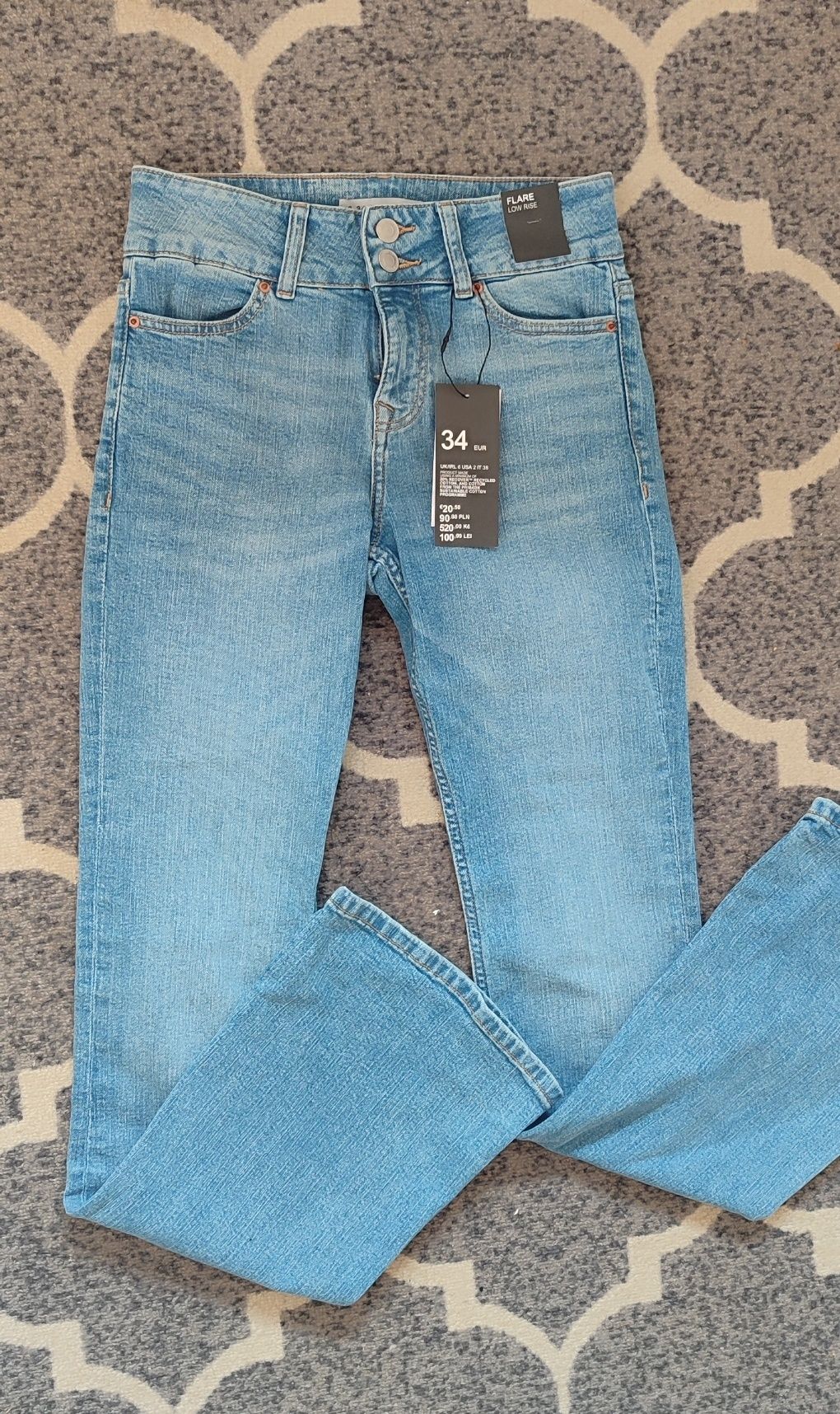 Nowe jeansy flare szerokie nogawki