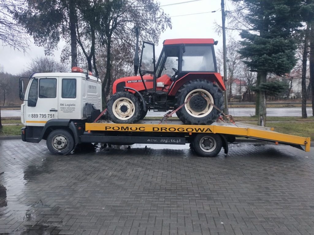 Transport samochodów ciągników maszyn pomoc drogowa auta zastępcze