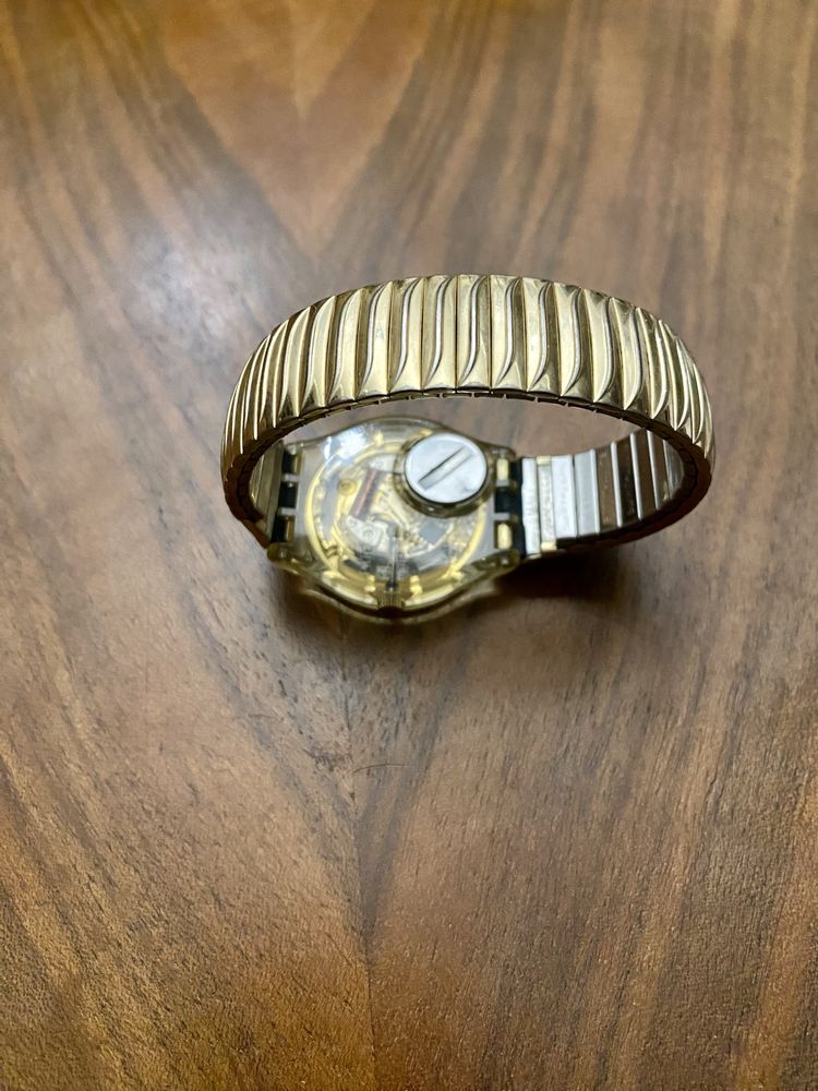 Swatch Dourado com bracelete dourada elástica de 1994 estado impecável