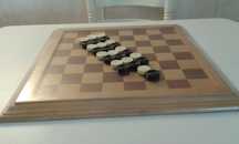 Jogo de damas c/moldura em madeira