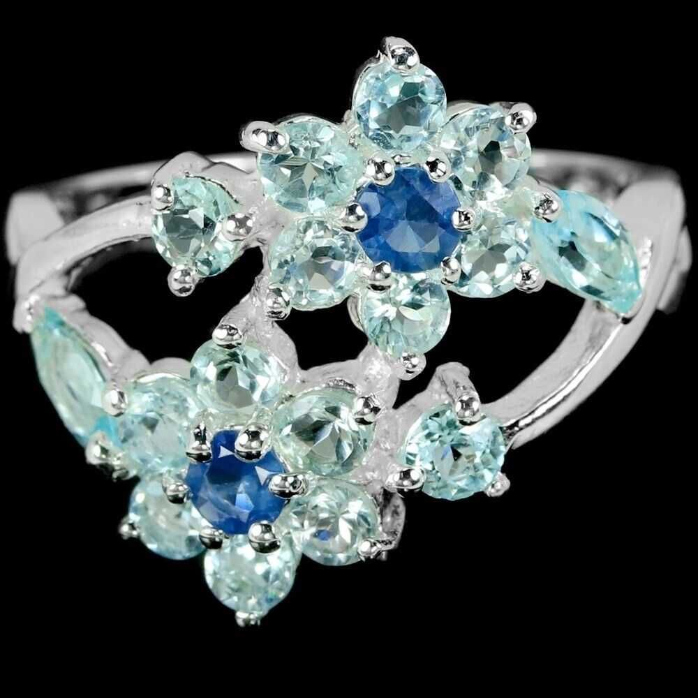 Серебряное кольцо с небесно -голубым топазом и сапфиром.Размер17.75