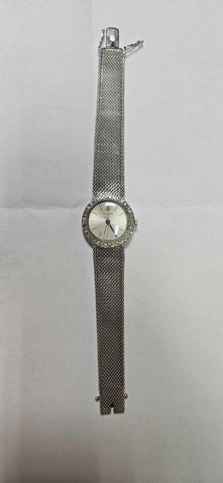 Piekny damski zegarek Corum złoty z brylantami białe złoto 750