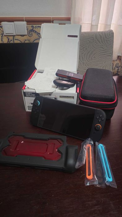 Nintendo switch 2 + conta 1 jogo pokem + sub 1 ano online + protecções