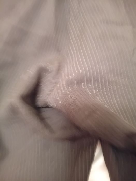 Calças de fato pretas as riscas brancas