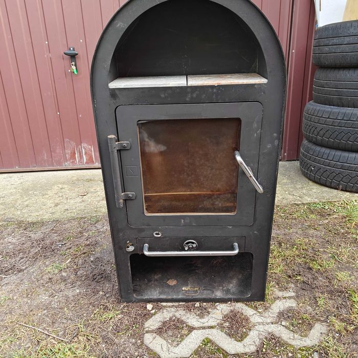 Kominek żeliwny z Norwegii koza piec stylowy exclusive Skandynawii