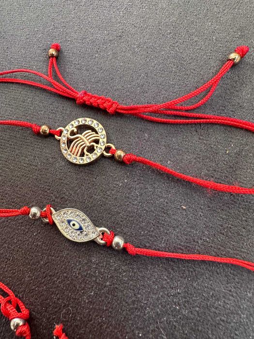 bransoletki szczęścia na czerwonym sznurku z skorpion, oko, flaming