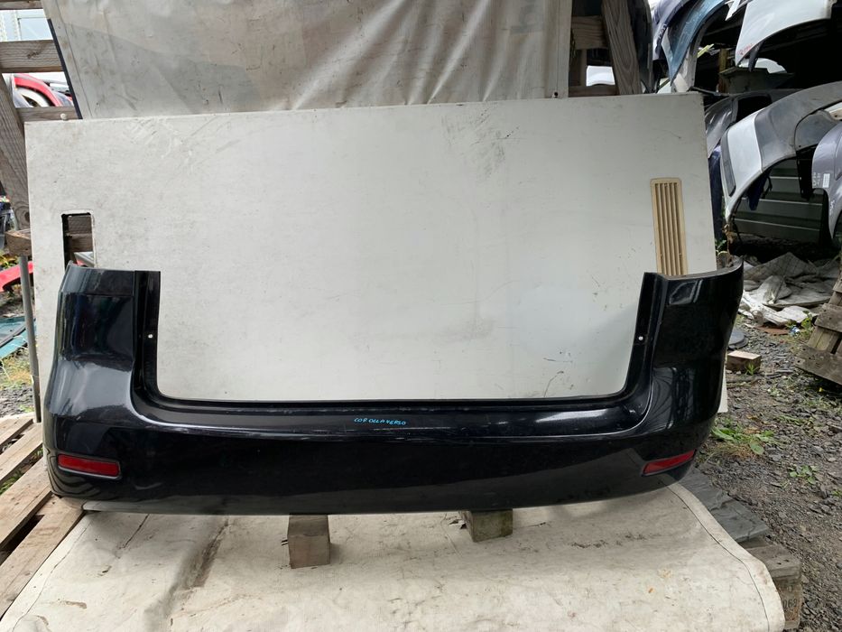 toyota corolla verso zderzak tylny tył czarny