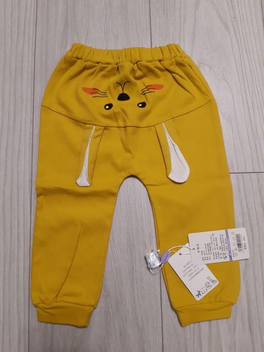 Яскраві дитячі штани на малюка 9-12 місяців