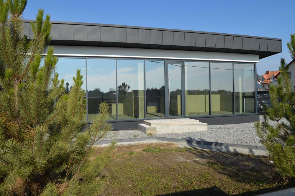 Будинок з фальцевим дахом та панорамним заскленням 75м² та 4 сот Тинне