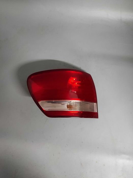 TOYOTA Avensis Verso, Lampa lewa tylna, Oryginał Koto, Europa!