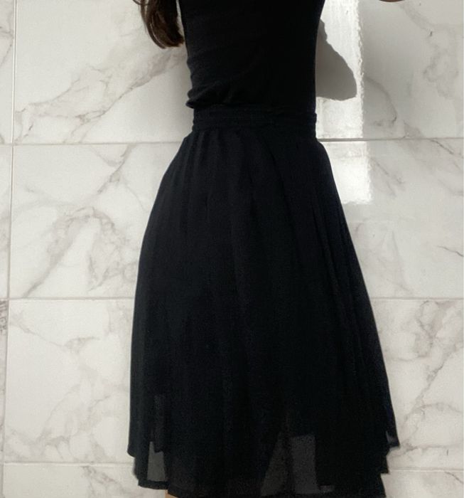 Чорна плісіповага спідниця