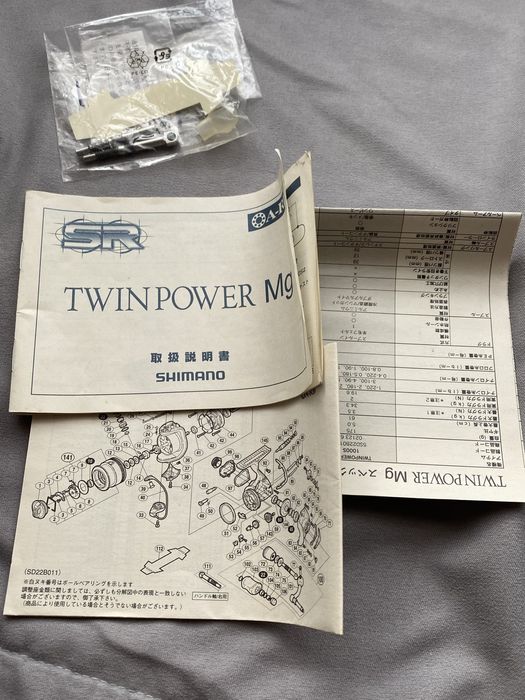 Kołowrotek Shimano Twin Power 06 Mg 2500s 3 szpule 2 korbki