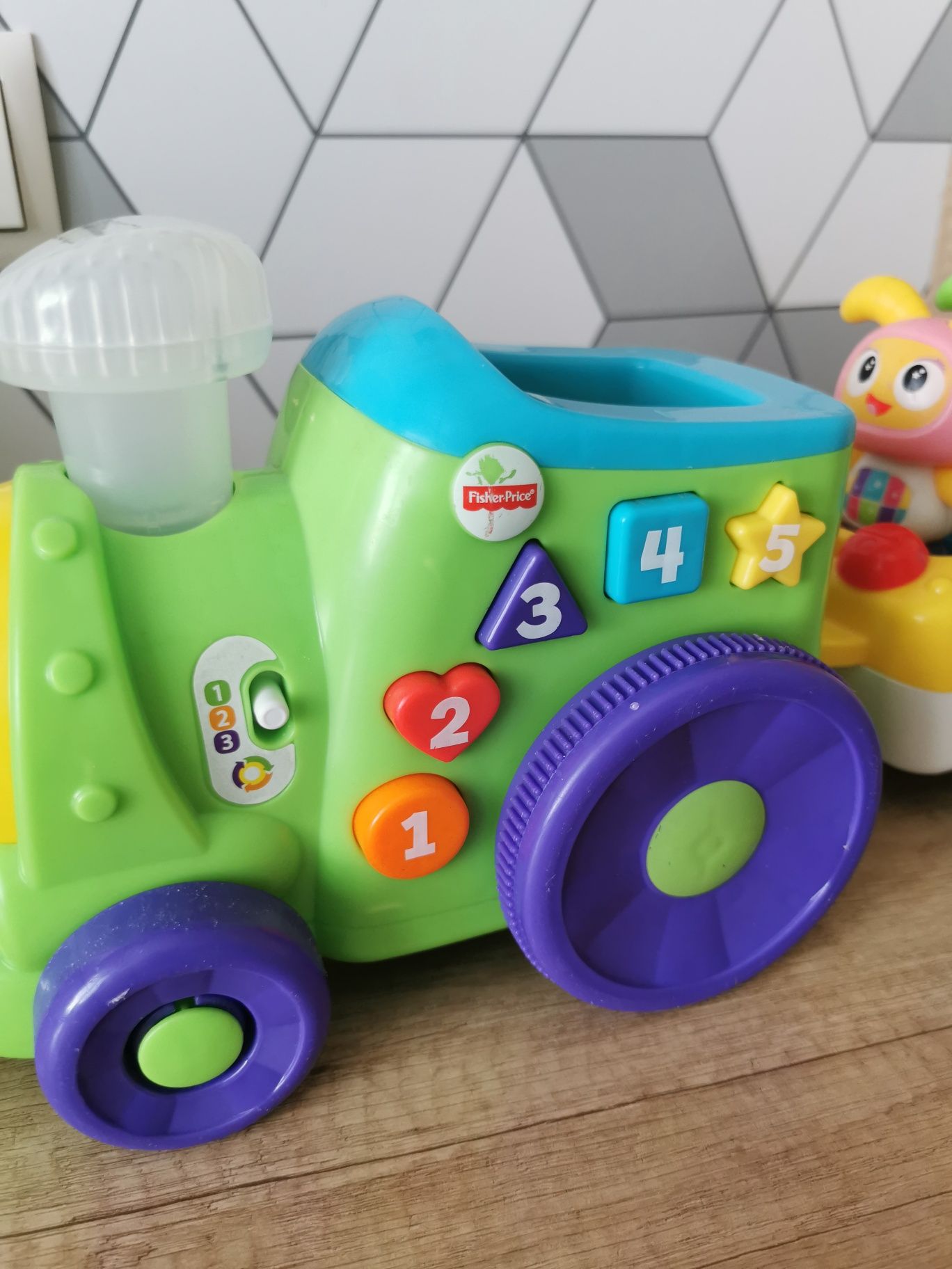 Interaktywny, jeżdżący, grajacy pociąg, ciuchcia Fisher Price