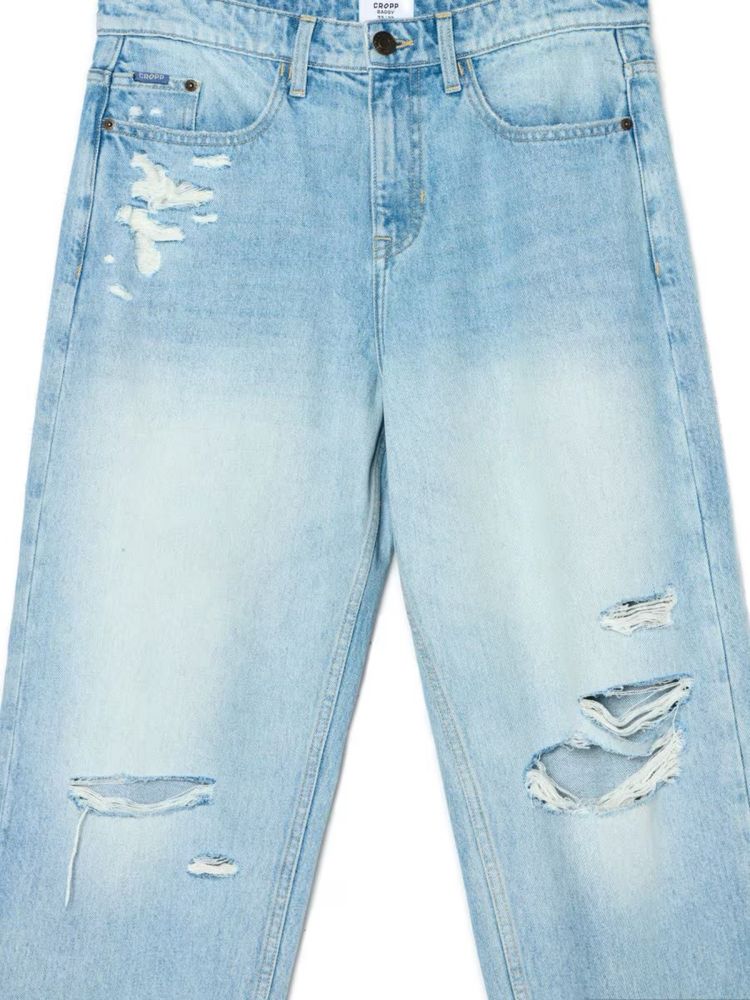 Spodnie jeansowe z dziurami przetarciami denimowe jeansy baggy Cropp