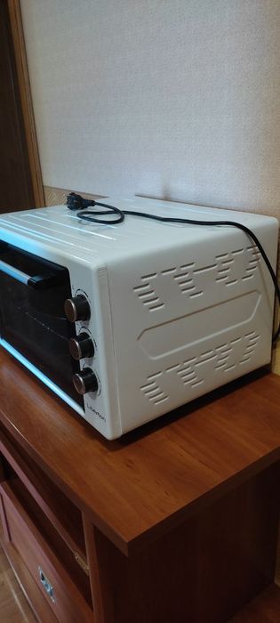 Продам печь liberton 42л