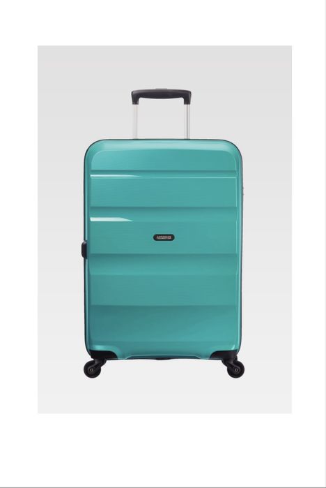 American tourister середня нова валізі, оригінал. М