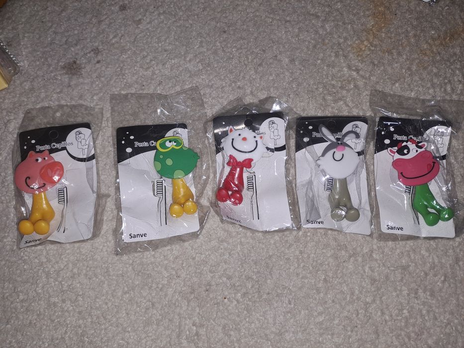 Uchwyty na szczoteczki Nowe