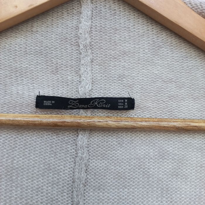 Casaco unisexo bege modelo morcego Tam. M