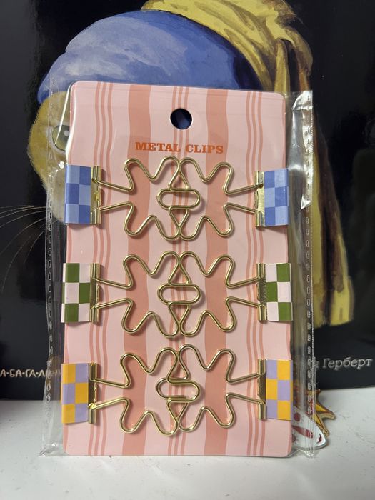 Біндери канцелярські квітки закладки