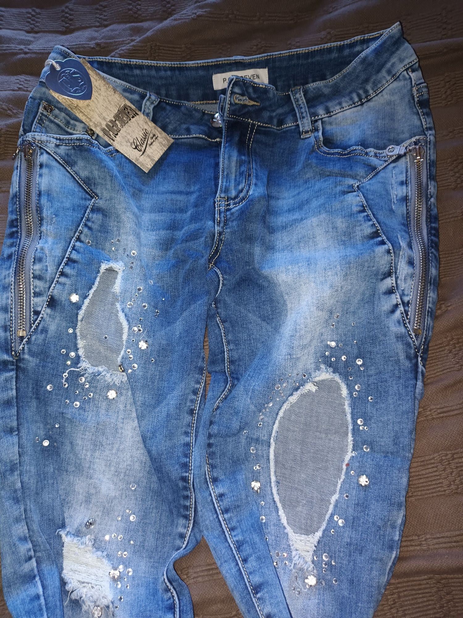 Nowe spodnie-rozciągliwy jeans