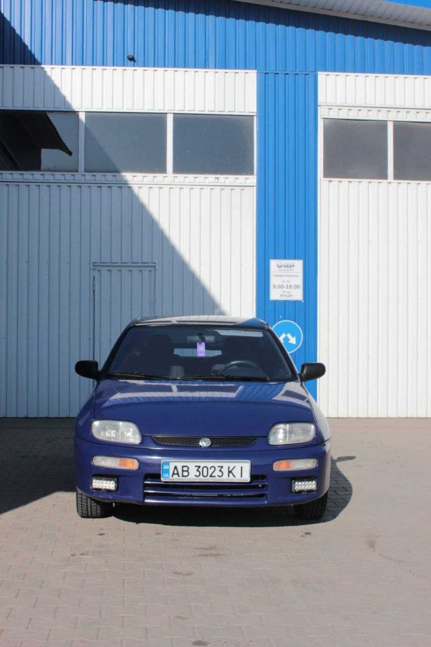 Мазда 323 f Mazda 323 BA f 1/3 газ бензин