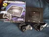 Sega Saturn com caixa e vários jogos