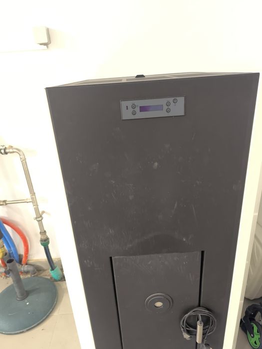 Caldeira Pellets Baxi e tubagem exaustão.