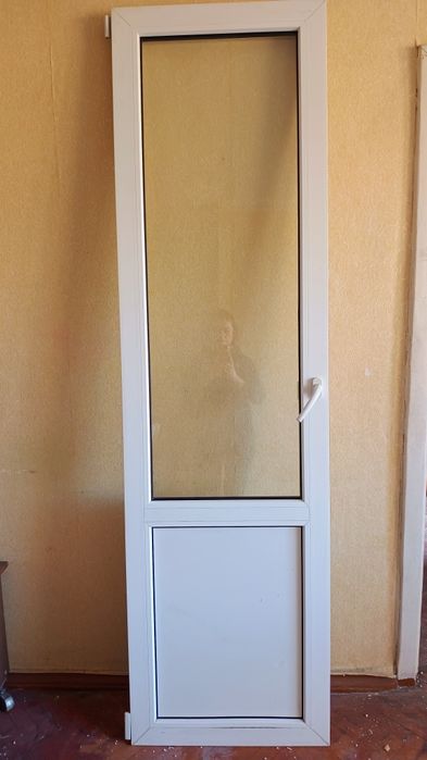 Двері балконні пластикові