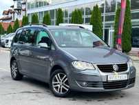 Volkswagen Touran 1.6LPG**Alusy**7osob**Doinwestowana**Zamiana**Klima*