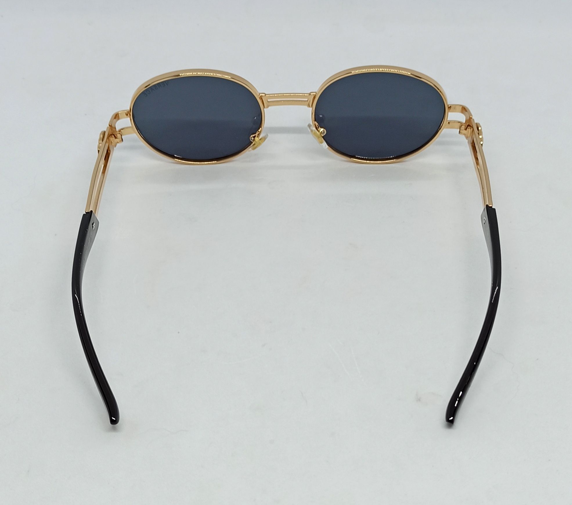 Versace очки унисекс овальные черные в золотом металле брендовые