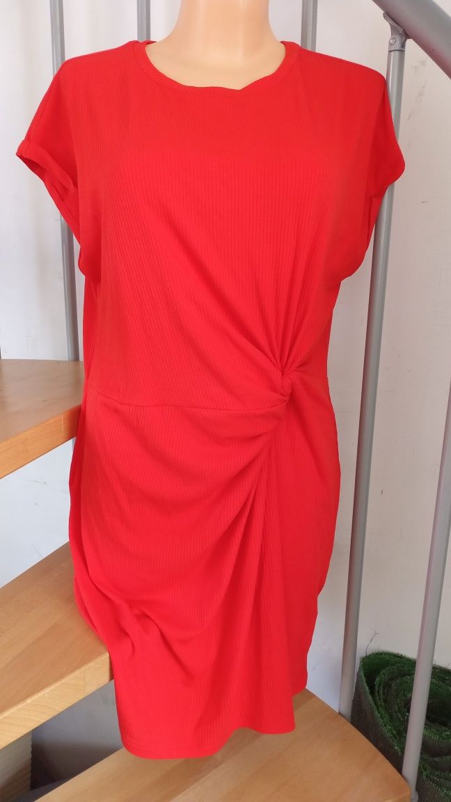 Sukienka z luźnymi rękawami neonowy pomarańczowy prążkowany materiał