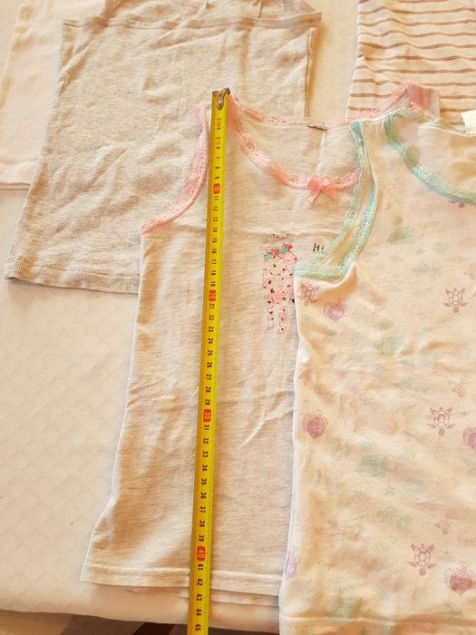 Zestaw 6 bawełnianych podkoszulek dziewczęcych  r. 122