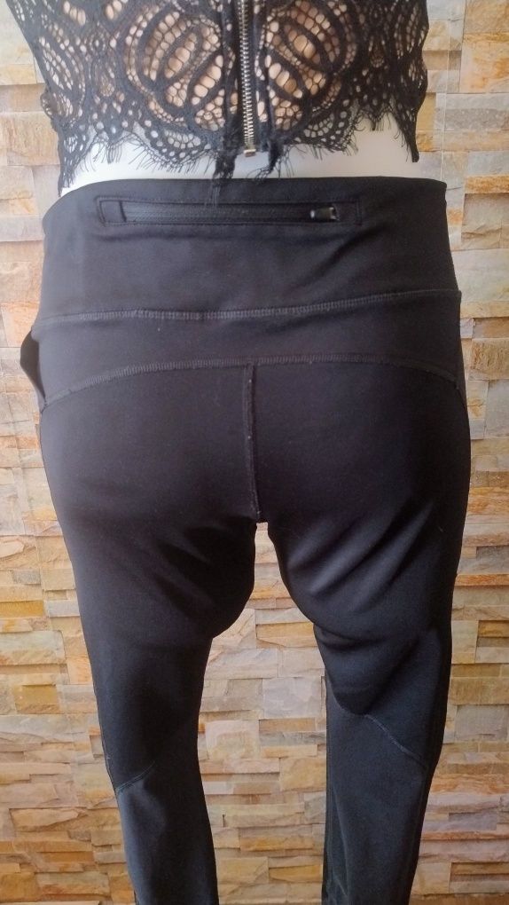 Sportowe legginsy damskie rozmiar L. Nike dri -fit