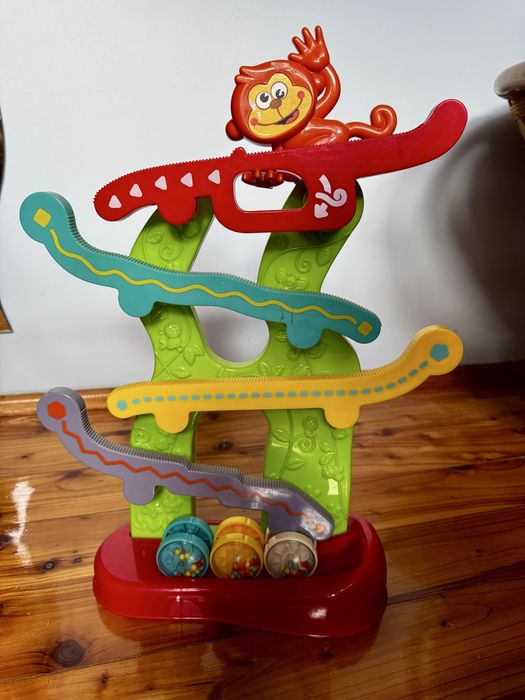 Zabawka happy monkey Szczęśliwa grająca małpka spadające kulki kółka