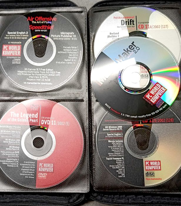 Płyty cd dvd PC World komputer w etui na płyty cd ponad 50 sztuk