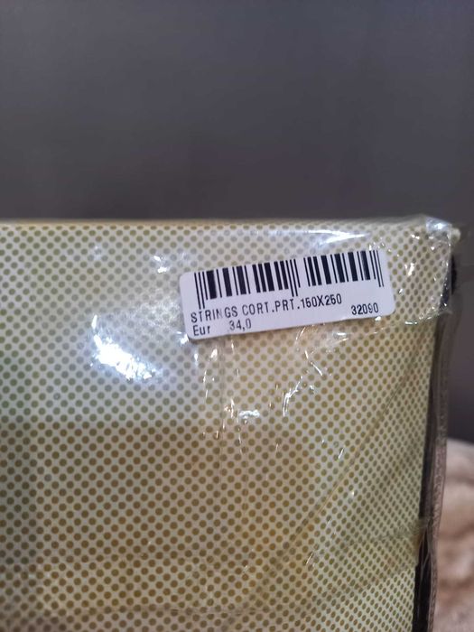 Cortina Loja Area Nova embalada